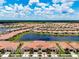 Bird's eye view of property and surrounding community at 17231 Holly Well Ave, Wimauma, FL 33598