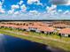 Property view from above, showcasing the home and community at 17231 Holly Well Ave, Wimauma, FL 33598