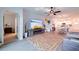 Living area with open floor plan and view of bedroom at 17231 Holly Well Ave, Wimauma, FL 33598