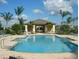 Relaxing community pool with patio furniture at 2510 Edgewater Falls Dr, Brandon, FL 33511