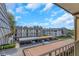 Community overview featuring building exteriors, parking, and landscaping at 8699 Bardmoor Blvd # 304, Seminole, FL 33777