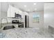 Updated kitchen with stainless steel appliances and granite countertops at 8699 Bardmoor Blvd # 304, Seminole, FL 33777
