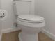 Clean and simple bathroom with a toilet and tile floor at 8699 Bardmoor Blvd # 304, Seminole, FL 33777