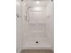 Simple shower with handheld shower head and built-in shelves at 8699 Bardmoor Blvd # 304, Seminole, FL 33777