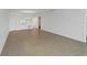 Spacious living room with tile floors and neutral walls at 8699 Bardmoor Blvd # 304, Seminole, FL 33777