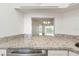 Kitchen features granite countertops and stainless steel appliances at 8699 Bardmoor Blvd # 304, Seminole, FL 33777