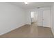 Spacious bedroom with tile floors and bathroom access at 8699 Bardmoor Blvd # 304, Seminole, FL 33777