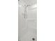 White shower stall with handheld shower head at 8699 Bardmoor Blvd # 304, Seminole, FL 33777