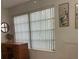 Bright bedroom with large window and wooden desk at 2310 Denmark St # 50, Clearwater, FL 33763