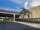 Condo building with covered entrance and landscaping at 2310 Denmark St # 50, Clearwater, FL 33763