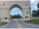 Gated community entrance with a large archway at 2310 Denmark St # 50, Clearwater, FL 33763