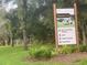 Community sign showing amenities and directions at 2310 Denmark St # 50, Clearwater, FL 33763