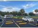 Parking lot with designated spaces and shuttle at 2310 Denmark St # 50, Clearwater, FL 33763