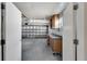 Spacious garage with work bench and storage cabinets; perfect for projects and organization at 609 Fox Hills Dr, Sun City Center, FL 33573