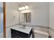 Bathroom features a vanity with a sink and toilet at 609 Fox Hills Dr, Sun City Center, FL 33573