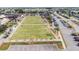 Aerial view of community lawn bowling greens at 609 Fox Hills Dr, Sun City Center, FL 33573