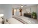 Comfortable main bedroom featuring soft colors, stylish furniture, and serene decor at 609 Fox Hills Dr, Sun City Center, FL 33573