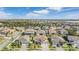 An aerial view showcasing the neighborhood and surrounding areas at 7134 Heather Sound Loop, Wesley Chapel, FL 33545