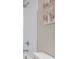Close-up of shower and toilet in a modern bathroom at 7134 Heather Sound Loop, Wesley Chapel, FL 33545