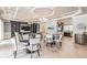 Elegant clubhouse with comfortable seating, a TV, and a kitchen area at 7134 Heather Sound Loop, Wesley Chapel, FL 33545