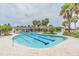 Community pool with a shallow end and plenty of space for lounging at 7134 Heather Sound Loop, Wesley Chapel, FL 33545