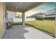 Spacious covered patio with seating area perfect for outdoor relaxation at 7134 Heather Sound Loop, Wesley Chapel, FL 33545