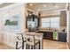 Convenient kitchenette area with essential appliances and seating at 7134 Heather Sound Loop, Wesley Chapel, FL 33545