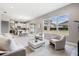 Open-concept living area with large windows providing ample natural light at 7134 Heather Sound Loop, Wesley Chapel, FL 33545
