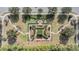 Well maintained community park with walking paths, benches, and lush landscaping seen from above at 7134 Heather Sound Loop, Wesley Chapel, FL 33545