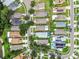 Aerial view of a residential neighborhood with houses, yards, and streets at 6108 Lanshire Dr, Tampa, FL 33634