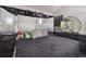 Spacious bedroom with mirrored headboard and plush bedding at 6108 Lanshire Dr, Tampa, FL 33634
