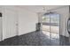 Bright kitchen features tile floors and sliding glass doors leading to backyard at 6108 Lanshire Dr, Tampa, FL 33634