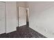 Simple bedroom with tile floor and access to hallway at 6108 Lanshire Dr, Tampa, FL 33634