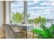 Home office with water views, featuring a modern desk and chair at 140 Riviera Dunes Way # 303, Palmetto, FL 34221