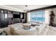 Ocean-view living room, featuring a spacious layout, comfortable seating, and built-in entertainment center at 11 Baymont St # 902, Clearwater Beach, FL 33767