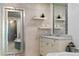 Elegant bathroom with marble vanity and large mirror at 11 Baymont St # 902, Clearwater Beach, FL 33767