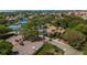 Community clubhouse with pool, tennis, and pickleball courts at 1134 S Pointe Alexis Dr, Tarpon Springs, FL 34689