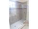 Large shower with glass enclosure and tile surround at 1134 S Pointe Alexis Dr, Tarpon Springs, FL 34689