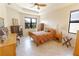 Main bedroom with wood furniture and large windows at 1134 S Pointe Alexis Dr, Tarpon Springs, FL 34689