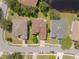 Aerial view of house and surrounding neighborhood at 1134 S Pointe Alexis Dr, Tarpon Springs, FL 34689