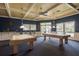 Community game room featuring two pool tables and a stylish interior at 1134 S Pointe Alexis Dr, Tarpon Springs, FL 34689