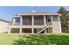 Large screened porch with ceiling fans at 1134 S Pointe Alexis Dr, Tarpon Springs, FL 34689