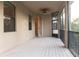 Screened balcony with access to kitchen and tranquil views at 1134 S Pointe Alexis Dr, Tarpon Springs, FL 34689