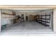 Spacious garage with shelving and ample storage space at 1134 S Pointe Alexis Dr, Tarpon Springs, FL 34689