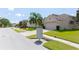 Residential street with community mailboxes at 1134 S Pointe Alexis Dr, Tarpon Springs, FL 34689
