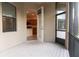 Screened balcony with access from kitchen area at 1134 S Pointe Alexis Dr, Tarpon Springs, FL 34689
