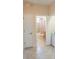 Full bathroom with tub and shower at 1134 S Pointe Alexis Dr, Tarpon Springs, FL 34689