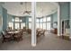 Relaxing community room with comfortable seating and a large TV at 1134 S Pointe Alexis Dr, Tarpon Springs, FL 34689