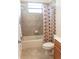 Clean bathroom with shower/tub combo and updated vanity at 1134 S Pointe Alexis Dr, Tarpon Springs, FL 34689