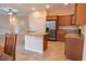 Modern kitchen with granite countertops and stainless steel appliances at 1134 S Pointe Alexis Dr, Tarpon Springs, FL 34689